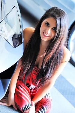 Lilly flashing by a car